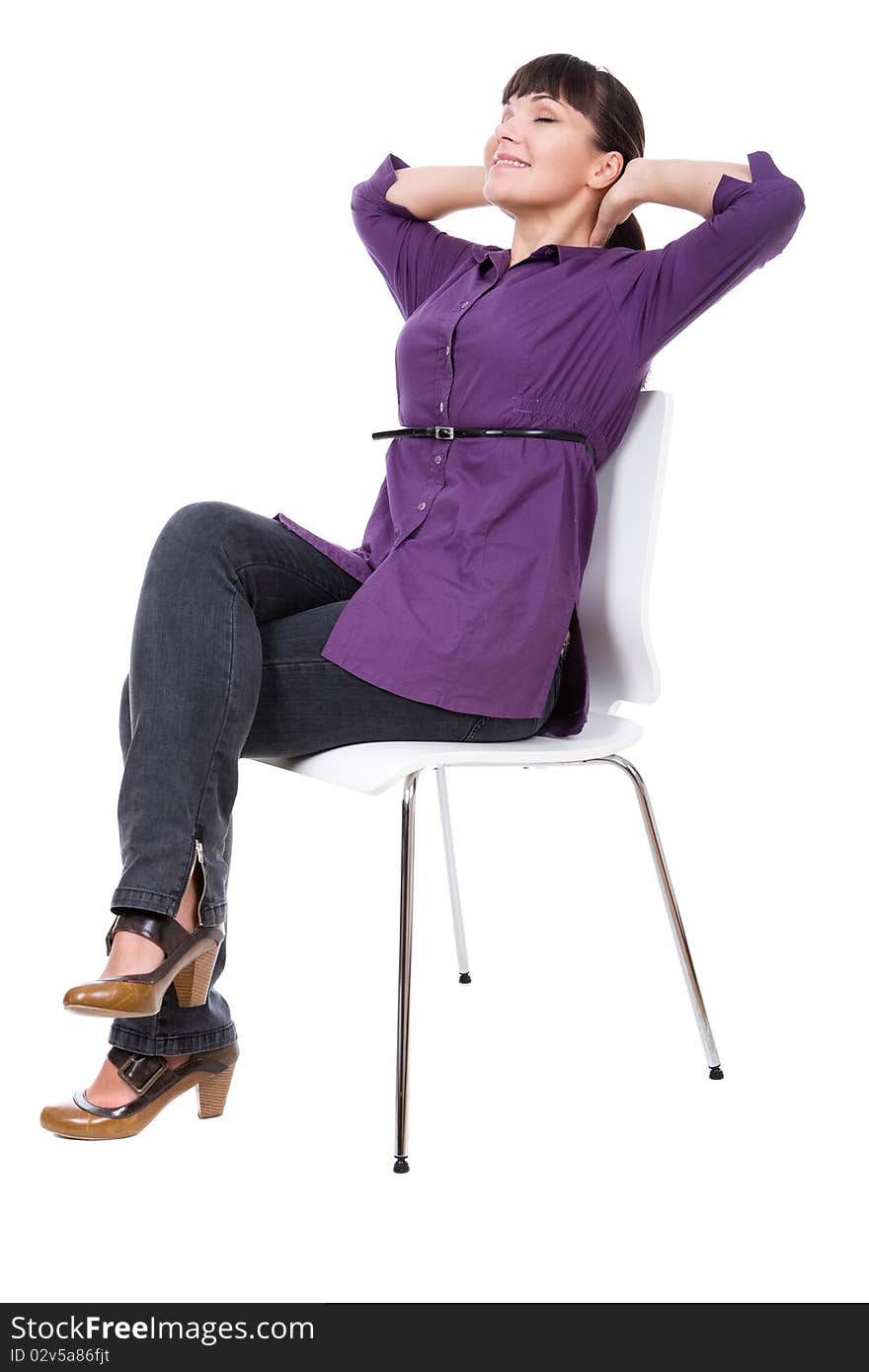 Young adult woman sitting on chair. over white background. Young adult woman sitting on chair. over white background