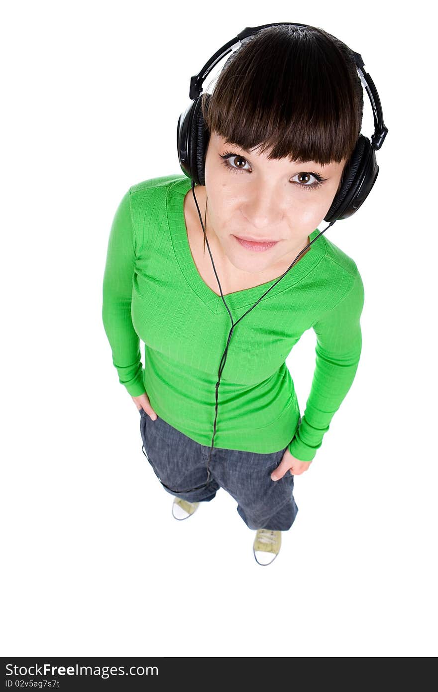 Young adult woman with headphones. over white background. Young adult woman with headphones. over white background