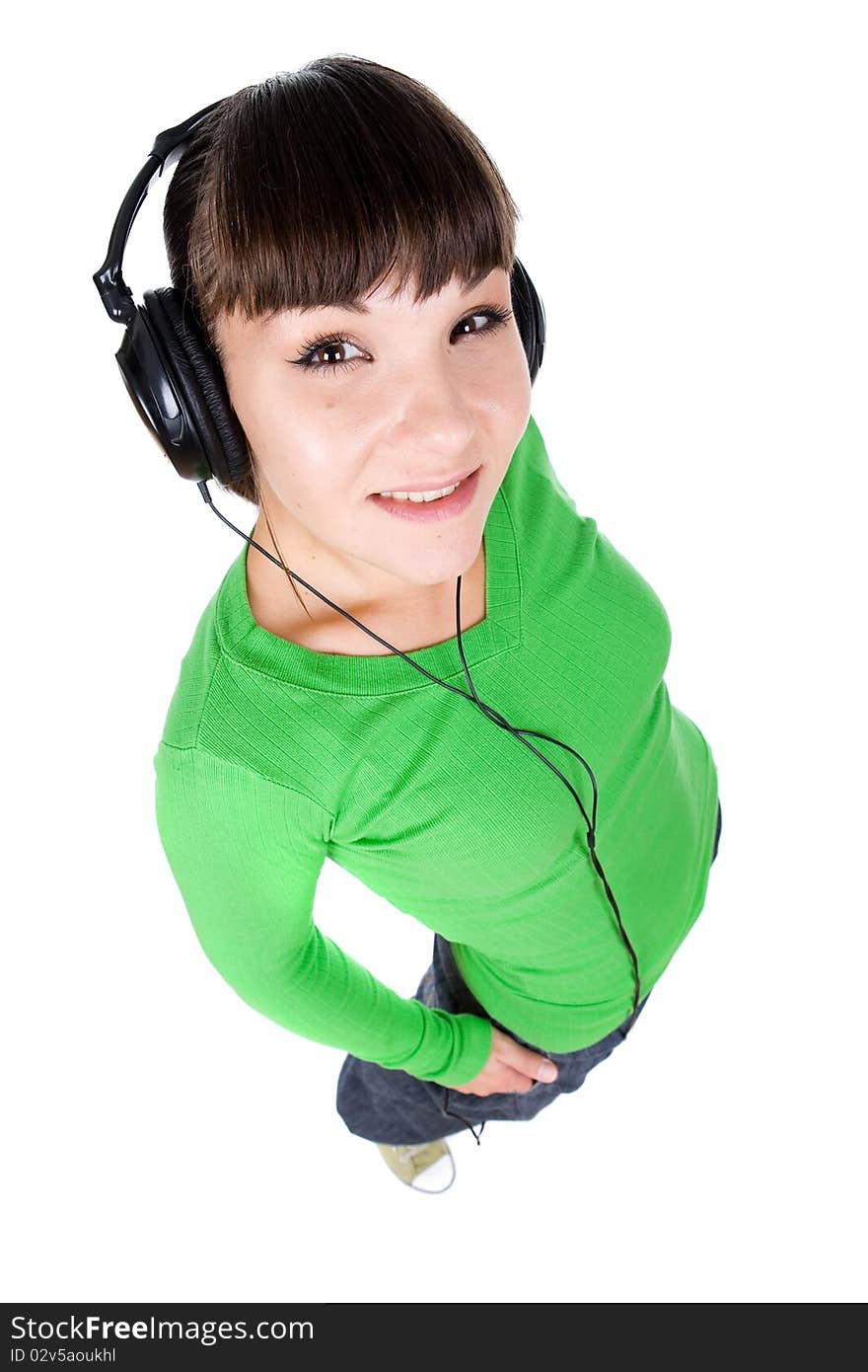 Young adult woman with headphones. over white background. Young adult woman with headphones. over white background