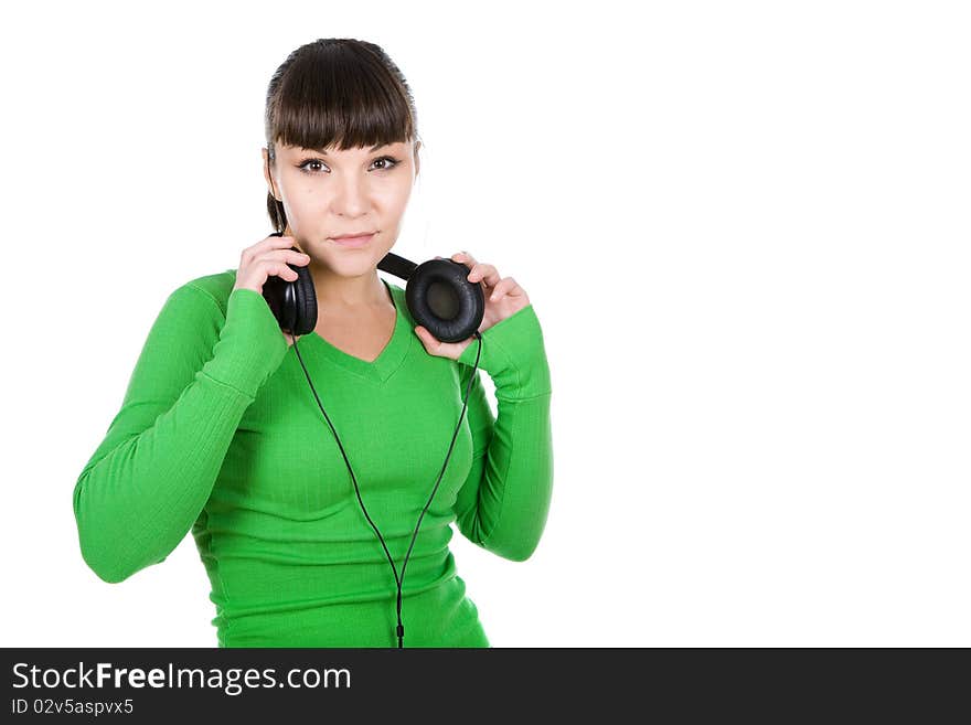 Young adult woman with headphones. over white background. Young adult woman with headphones. over white background