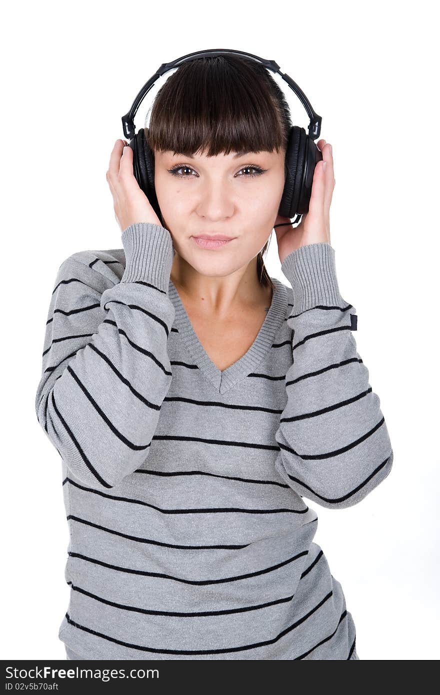 Young adult woman with headphones. over white background. Young adult woman with headphones. over white background