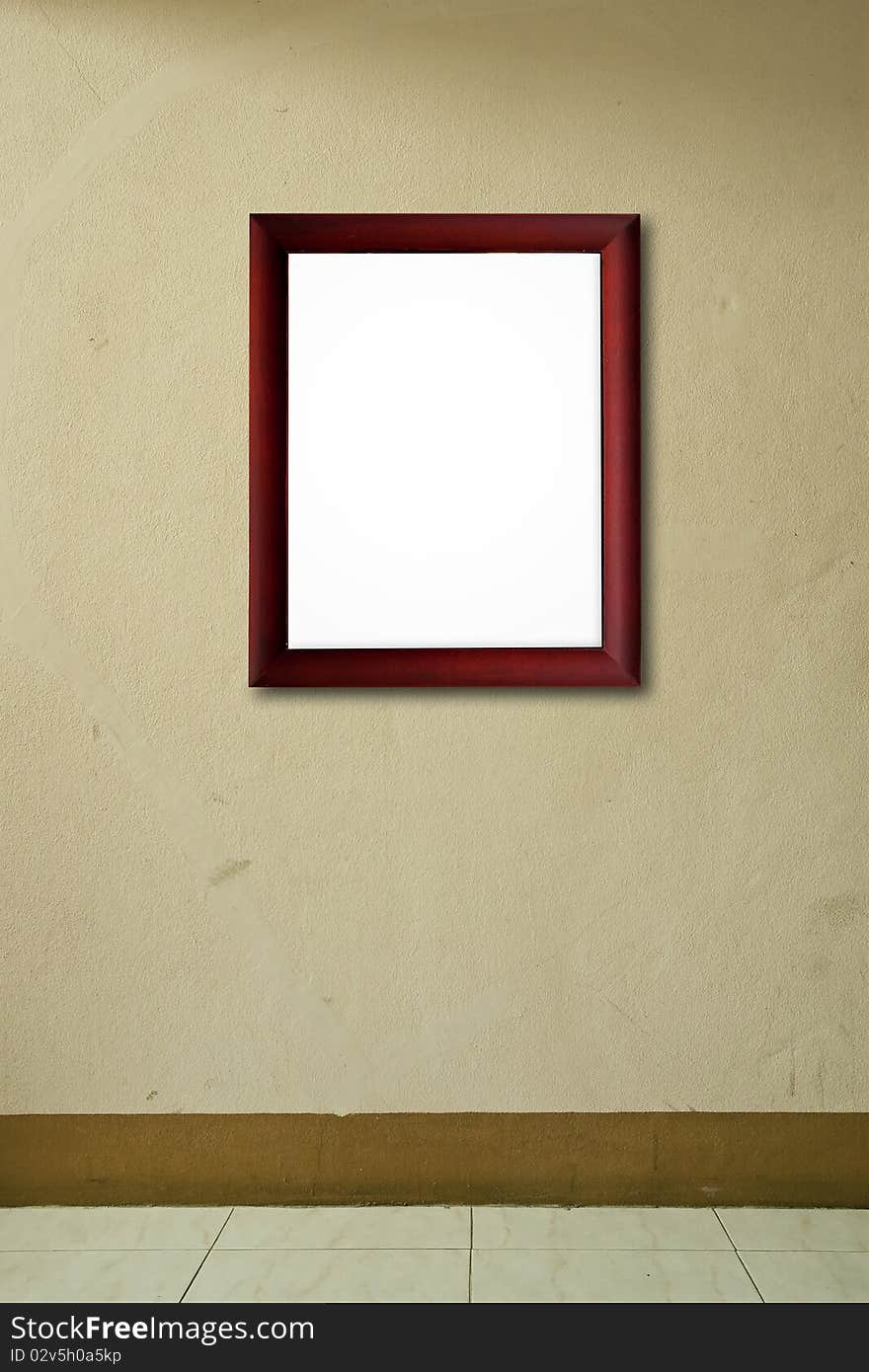 Old wooden frame on pink wall