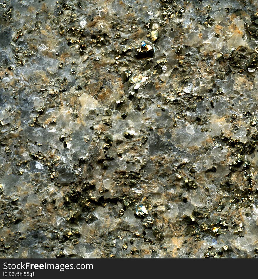 Texture of pyrite crystal inclusion in quartz, like gold. Texture of pyrite crystal inclusion in quartz, like gold