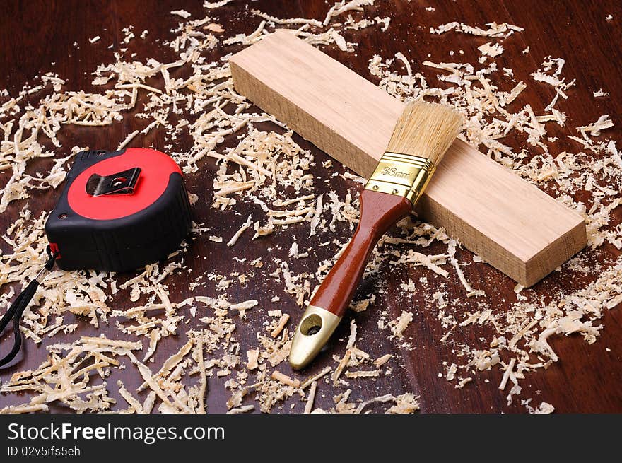 Shavings of wood, brick and roulette for measuring