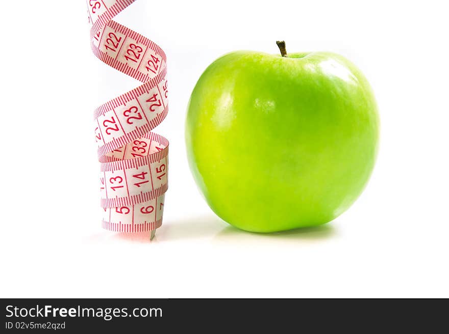 Green Apple isolated on white with measuring tape. Great diet concept.