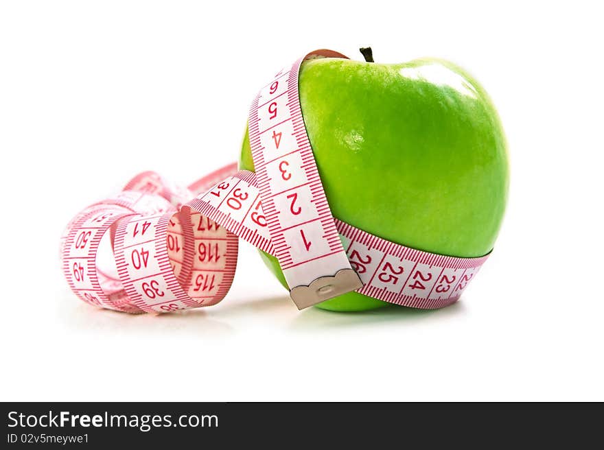 Green Apple isolated on white with measuring tape. Great diet concept.