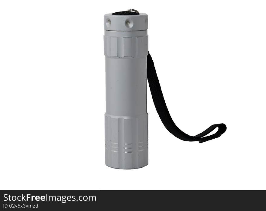 Aluminum flashlight with a black strap on a white background