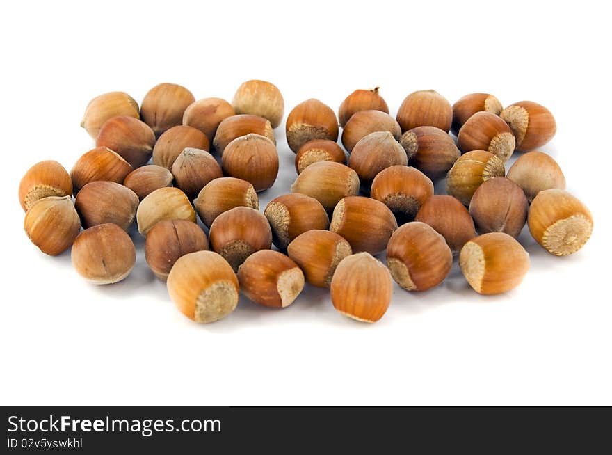 Heap of hazelnut on white background