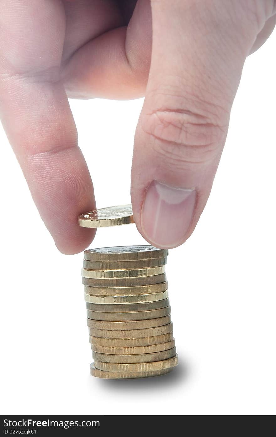 A hand picking up (or stacking up) some coins, business concept, isolated on white. A hand picking up (or stacking up) some coins, business concept, isolated on white