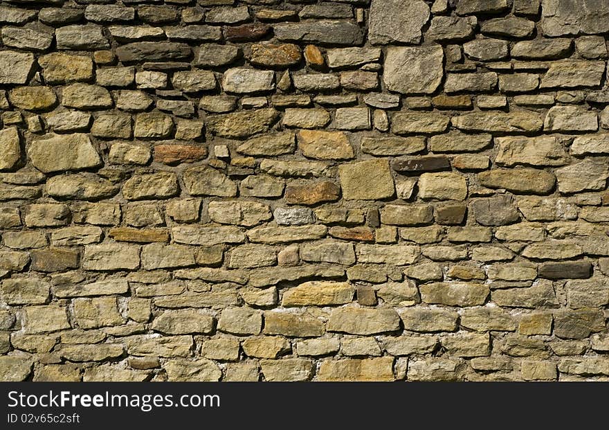 Old wall made of stone. Old wall made of stone