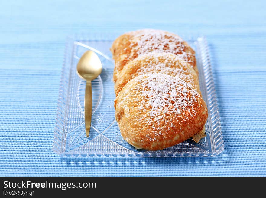 Pancakes sprinkled with powdered sugar - closeup