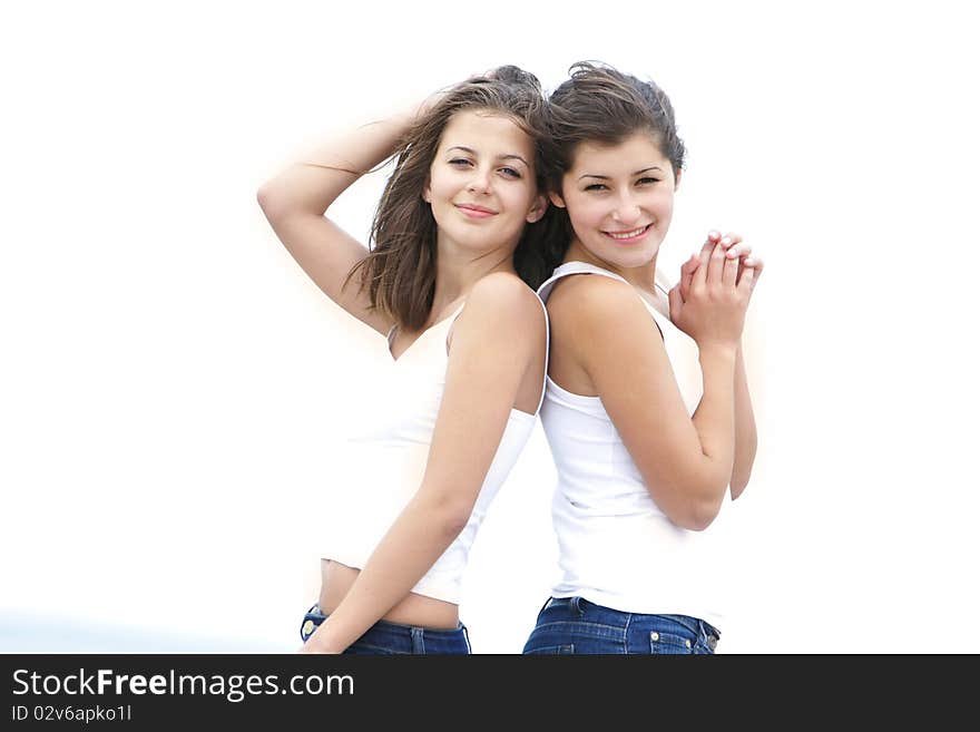 Happy Girls On Natural Background