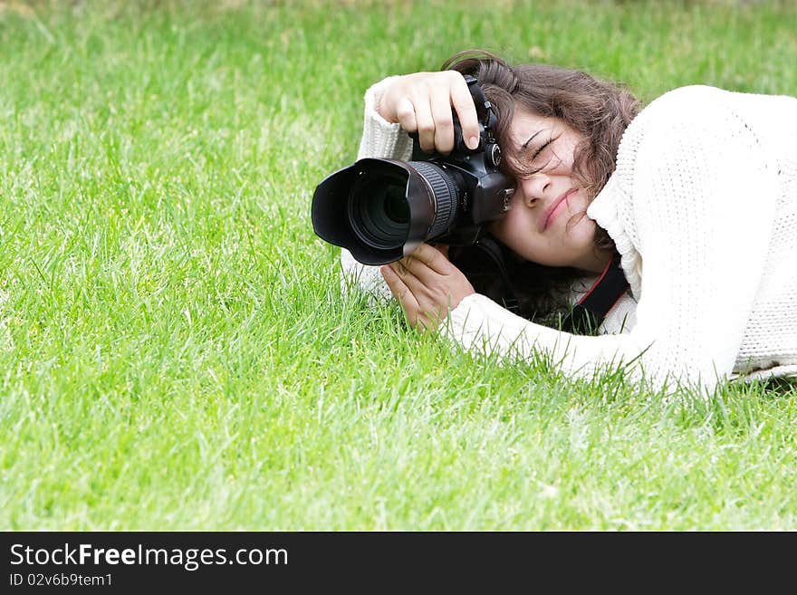 Girl taking pictures on nature