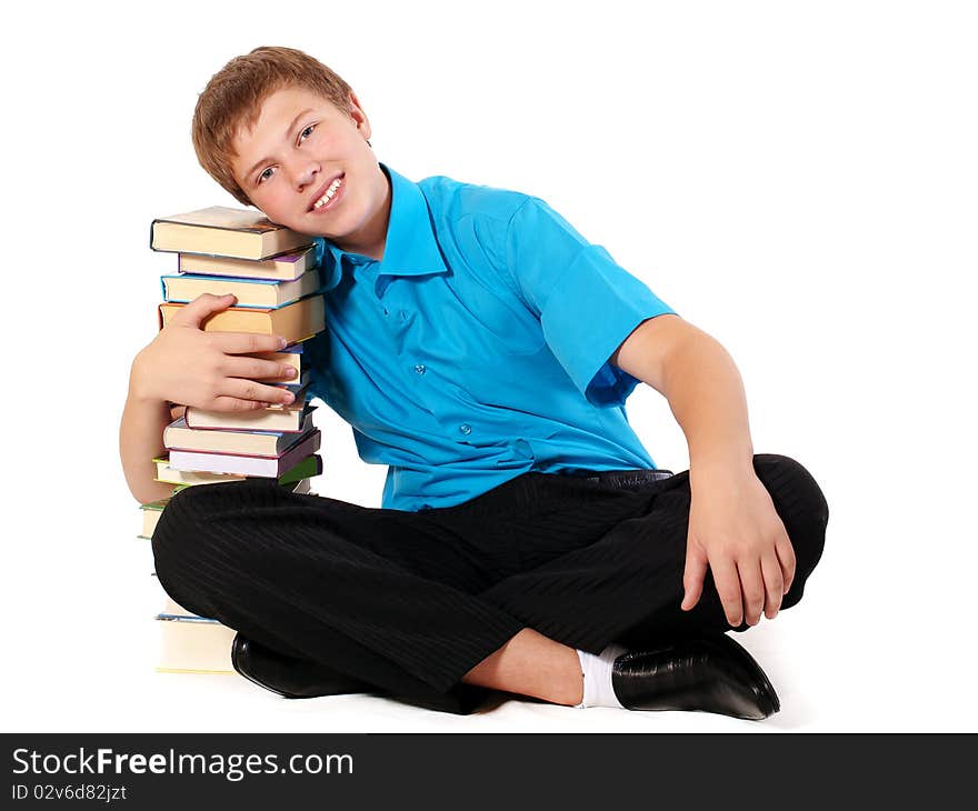 Young handsome student with pile of books