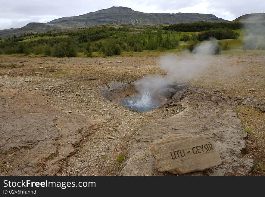 The small geyser on Icelandic - Litli Geysir. The small geyser on Icelandic - Litli Geysir.