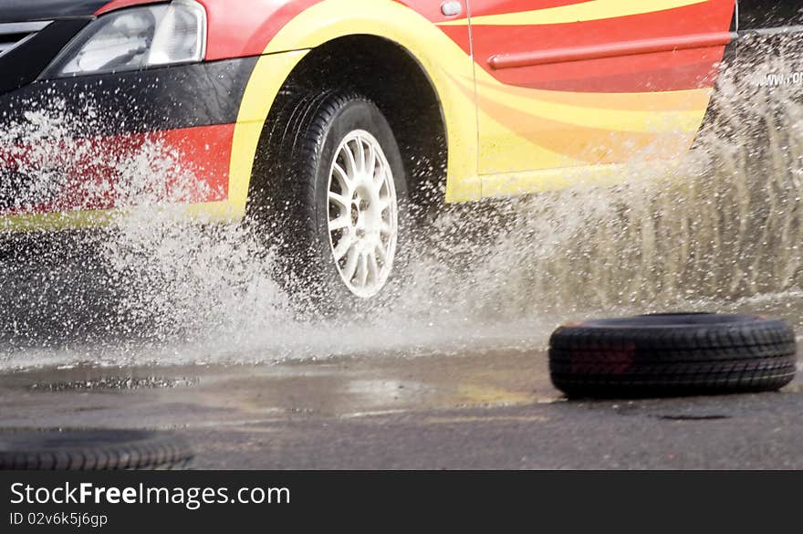 Racing car entering water