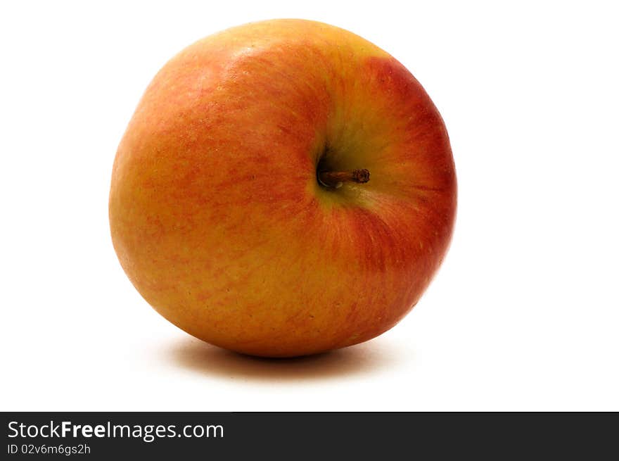 Red-and-yellow apple isolated over white background