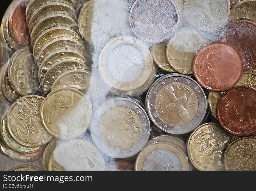 Shiny Euro Coins Frozen In Ice