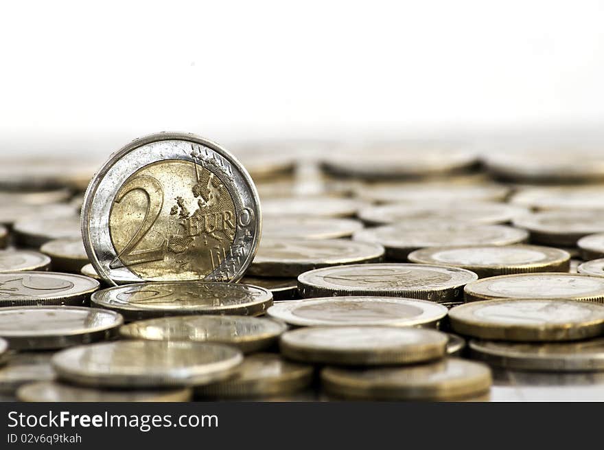 Grungy 2 euro coin on white background