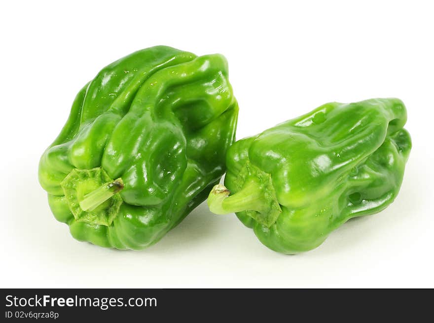 green pepper on white background close up shoot