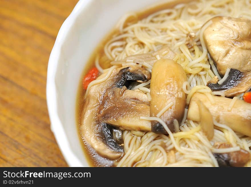 Sumptuous looking Chinese style vegetarian noodles. Made with mushrooms and herbal medicine. For concepts such as healthy lifestyle, and food and beverage. Sumptuous looking Chinese style vegetarian noodles. Made with mushrooms and herbal medicine. For concepts such as healthy lifestyle, and food and beverage.