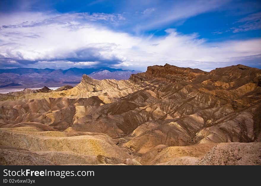 A scenic view of eroded rock formation in desolated Death Valley. USA, California. A scenic view of eroded rock formation in desolated Death Valley. USA, California