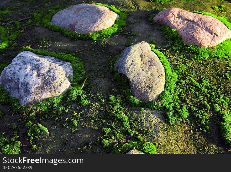 Old structure from stones which are covered by a moss. Old structure from stones which are covered by a moss