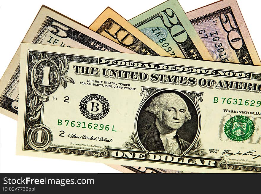 The various American dollars combined together on a white background. The various American dollars combined together on a white background