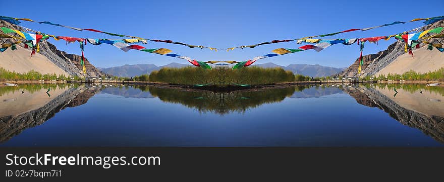 Reflection of the lake with Tibetan's flag