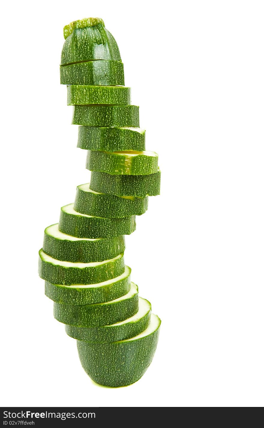 Fresh green courgette on white background