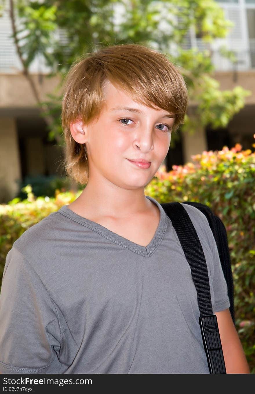 Portrait Of A Boy With A Bag .