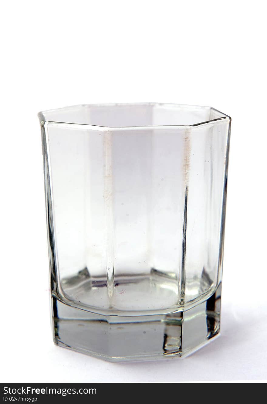 An empty octagon glass on a white background. An empty octagon glass on a white background