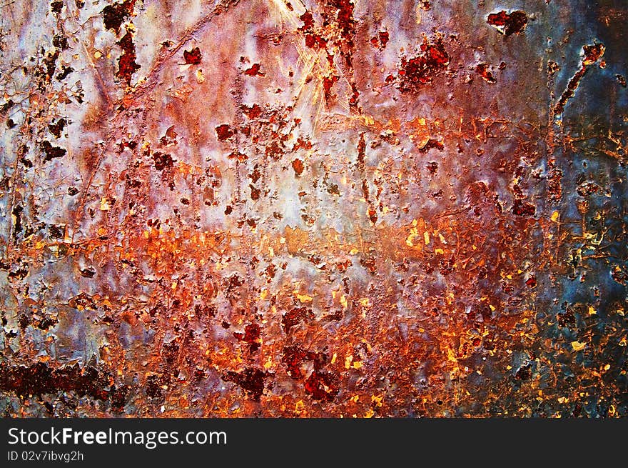 Oxidized  metal sheet covered with old paint.