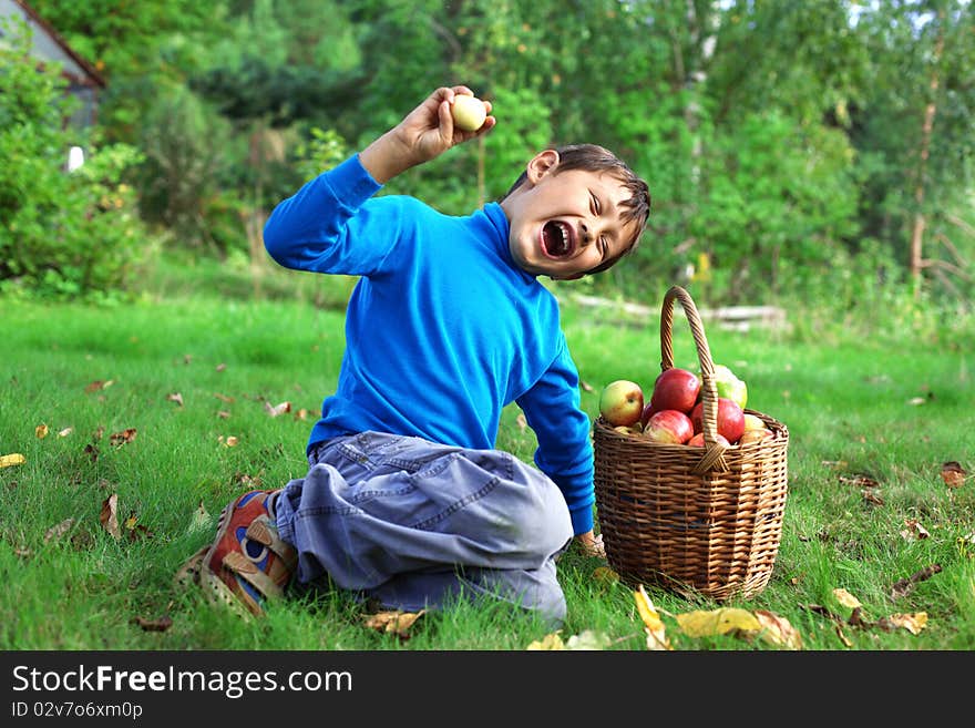 Little Boy With Apples