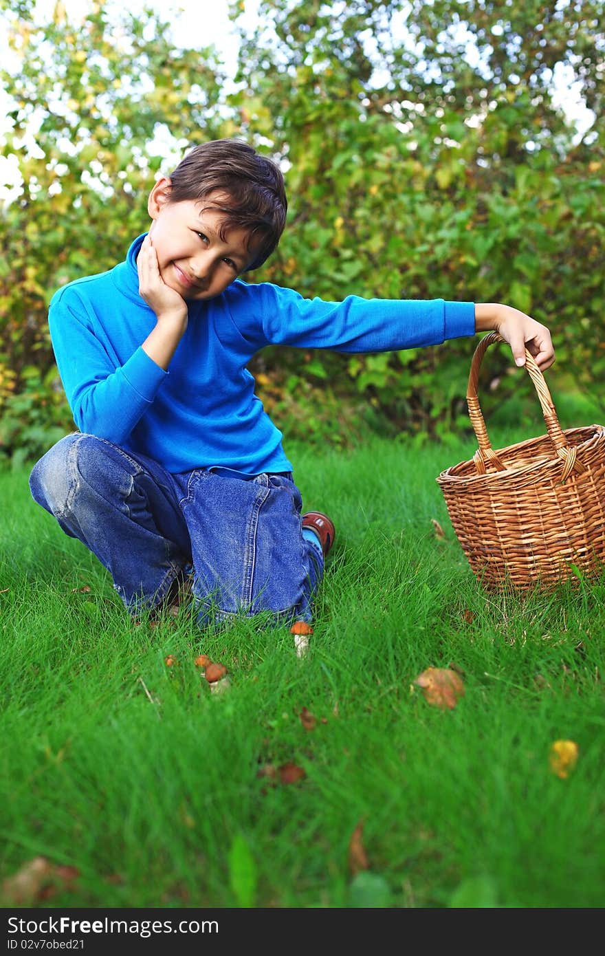 Little boy with mushrooms