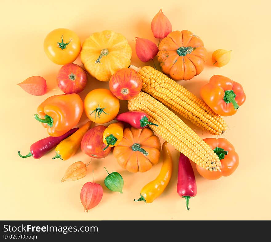 Fresh healthy vegetables on yellow background