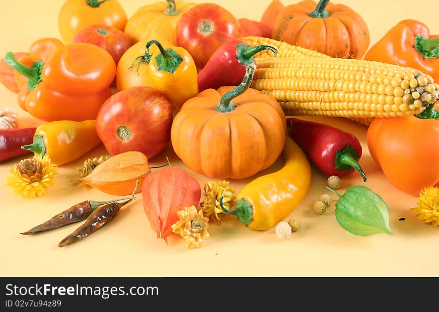 Fresh healthy vegetables on yellow background. Fresh healthy vegetables on yellow background