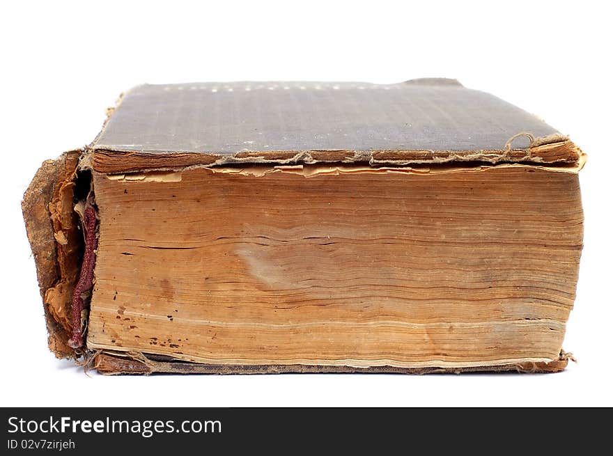 Old turned yellow book close up on a white background. Old turned yellow book close up on a white background