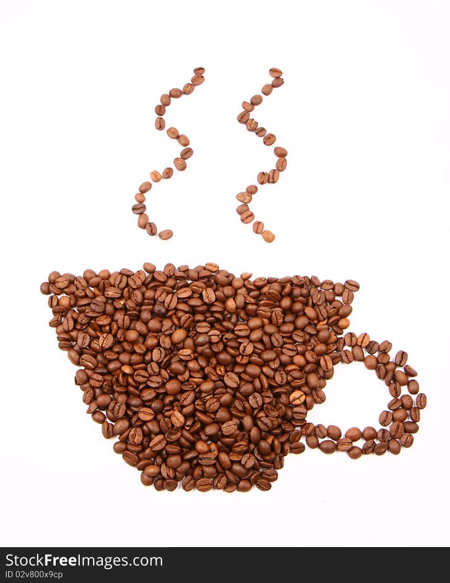 Cup of coffee shape made of coffee beans on white background