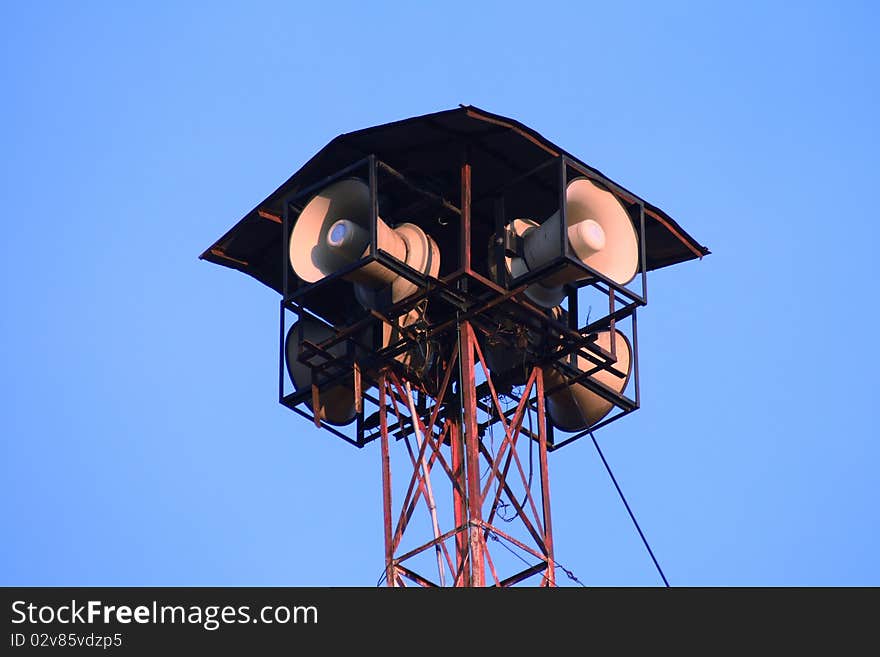 A tannoy speaker system against a blue sky