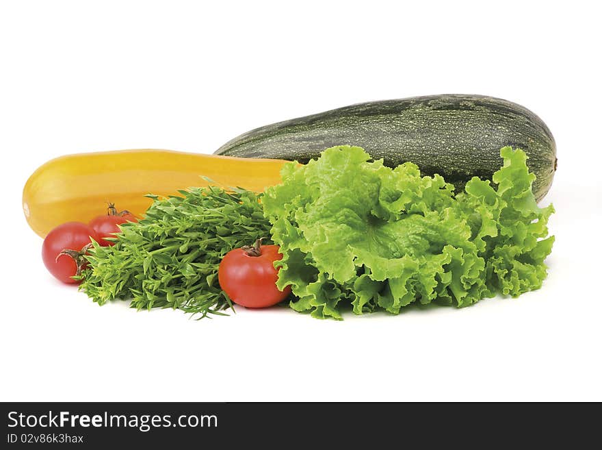 Fresh tasty vegetables isolated on white background. Lettuce, Tomato, Basil, Squash and Zucchini. Fresh tasty vegetables isolated on white background. Lettuce, Tomato, Basil, Squash and Zucchini.