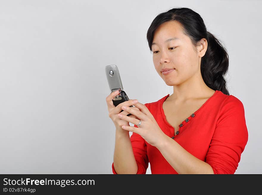 An Asian girl on the phone，which taken in China