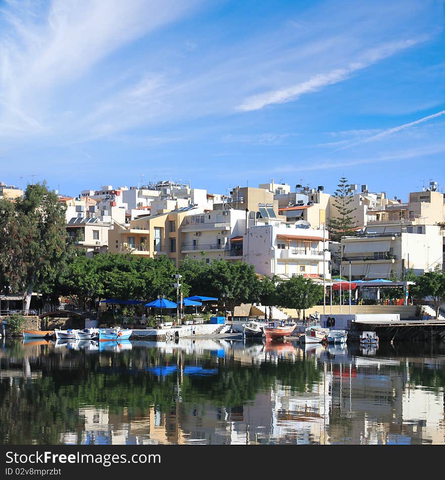 Beautiful Greek city. Reflected in the water. Beautiful Greek city. Reflected in the water