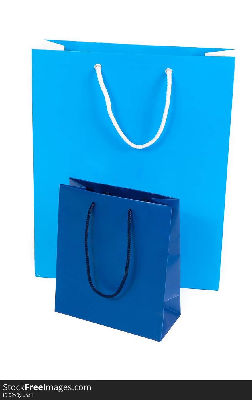 Two blue shopping bags isolated on white