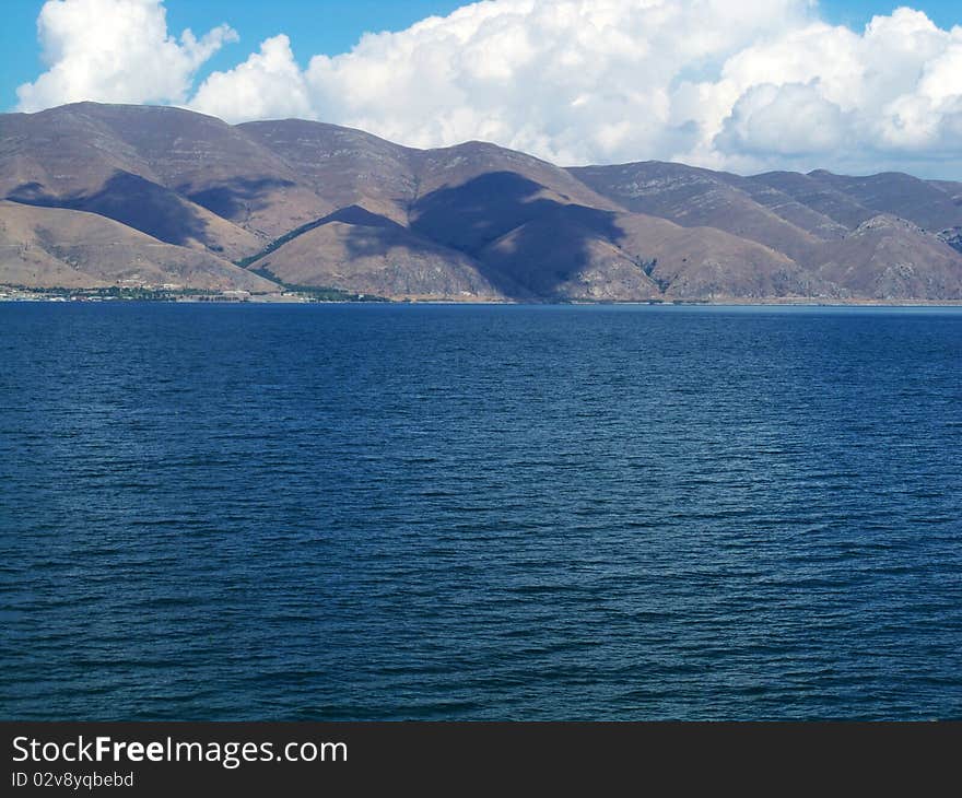 Mountain lake in sunny day. Mountain lake in sunny day