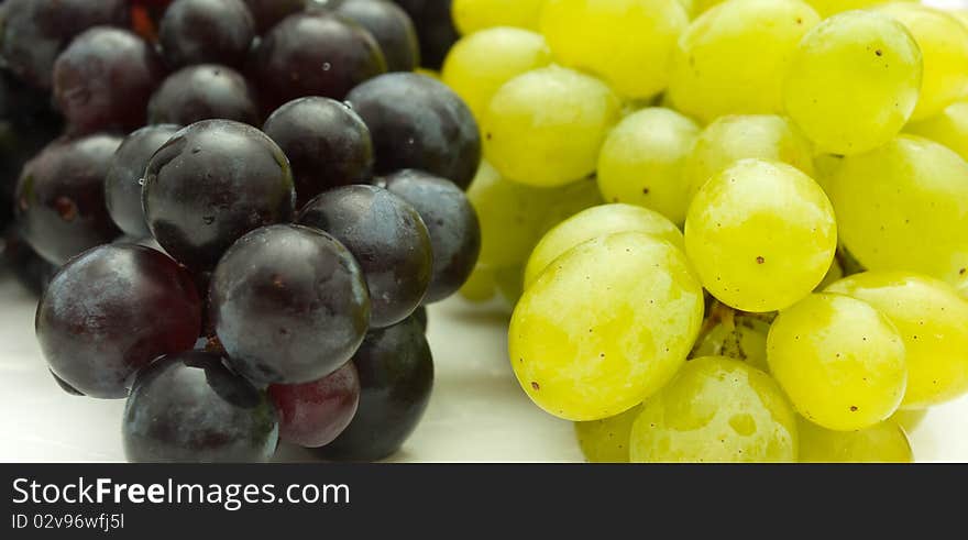 Bunch of grapes on white background