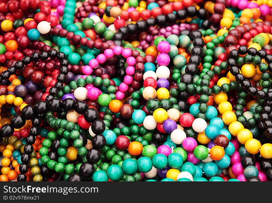 Collection of wooden many-colored adornments for the women. Collection of wooden many-colored adornments for the women