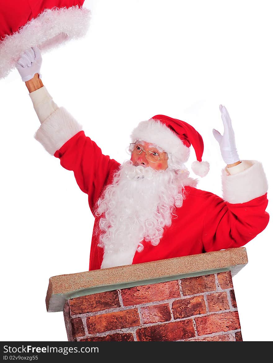 Santa slipping down a chimney followed by his sack. Isolated on white. Santa slipping down a chimney followed by his sack. Isolated on white.