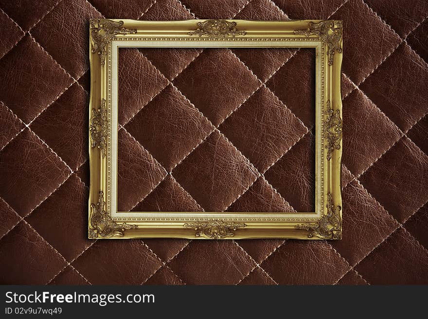 Golden frame on finishing leather. Golden frame on finishing leather