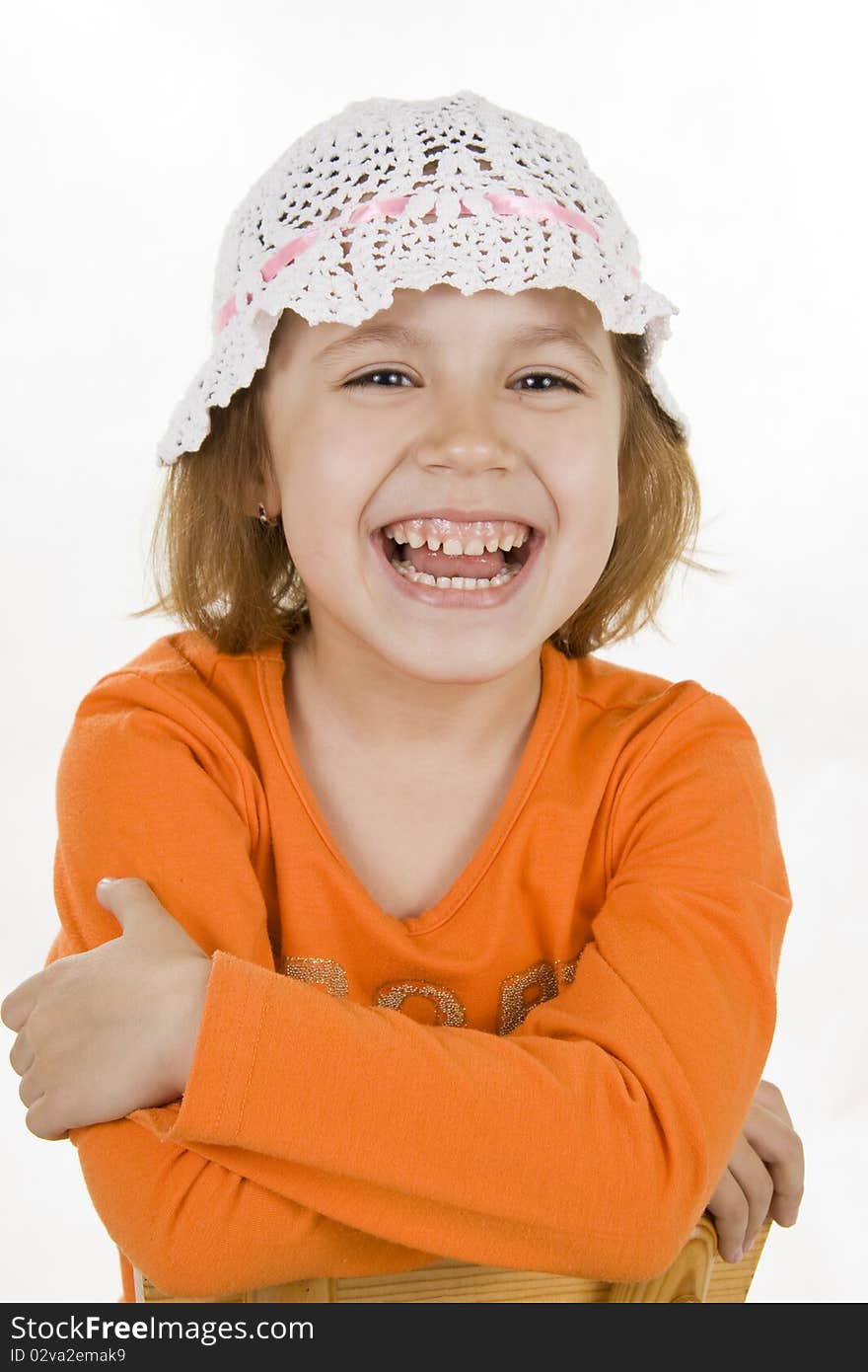 Fan little girl smiling. Isolated white.